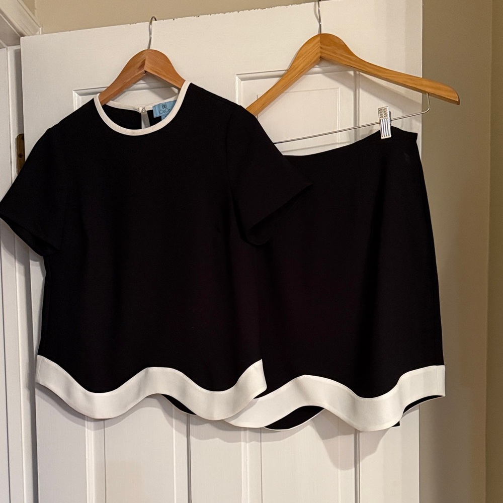 CeCe Cream and Black Garment